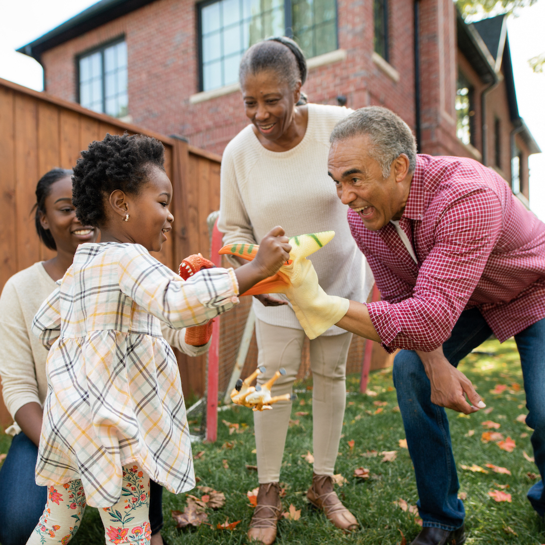 Grandparents, parent and granddaughter together